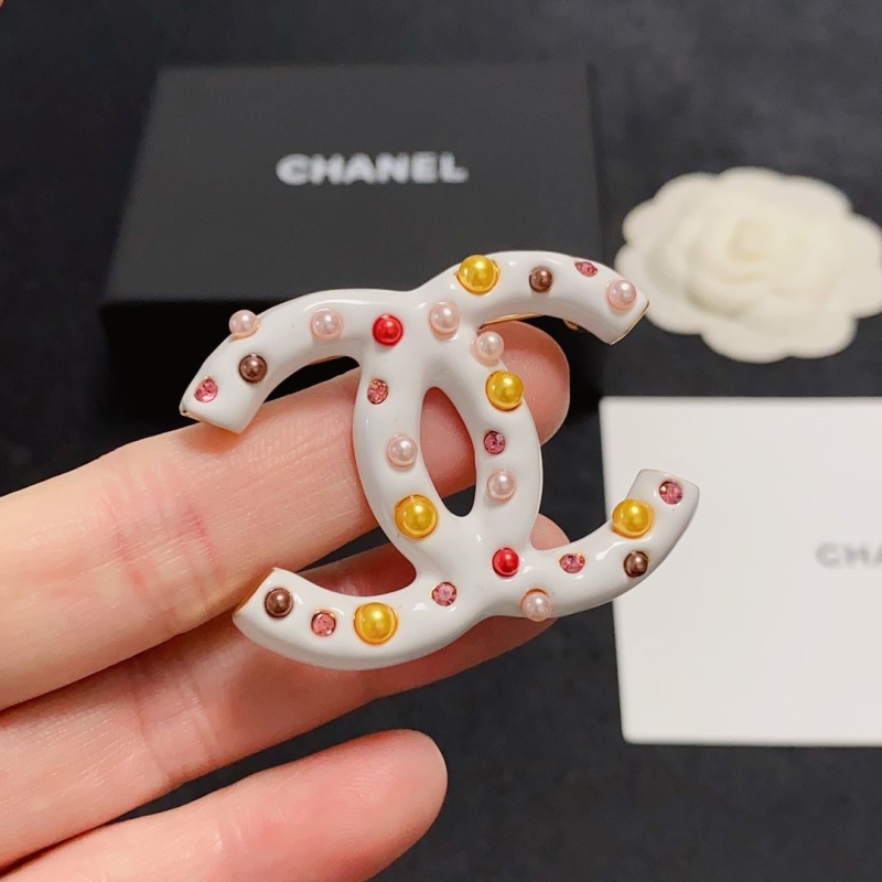 Ch**el brooches